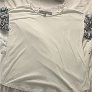 Medium white top and grey striped ruffled sleeves
